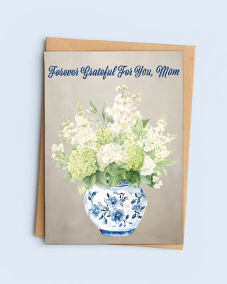 Greeting card with floral design and 'Forever Grateful For You, Mom' text on a light blue background