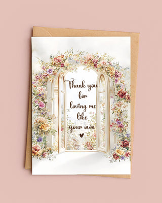 Greeting card with floral arch and heartfelt message on a pink background